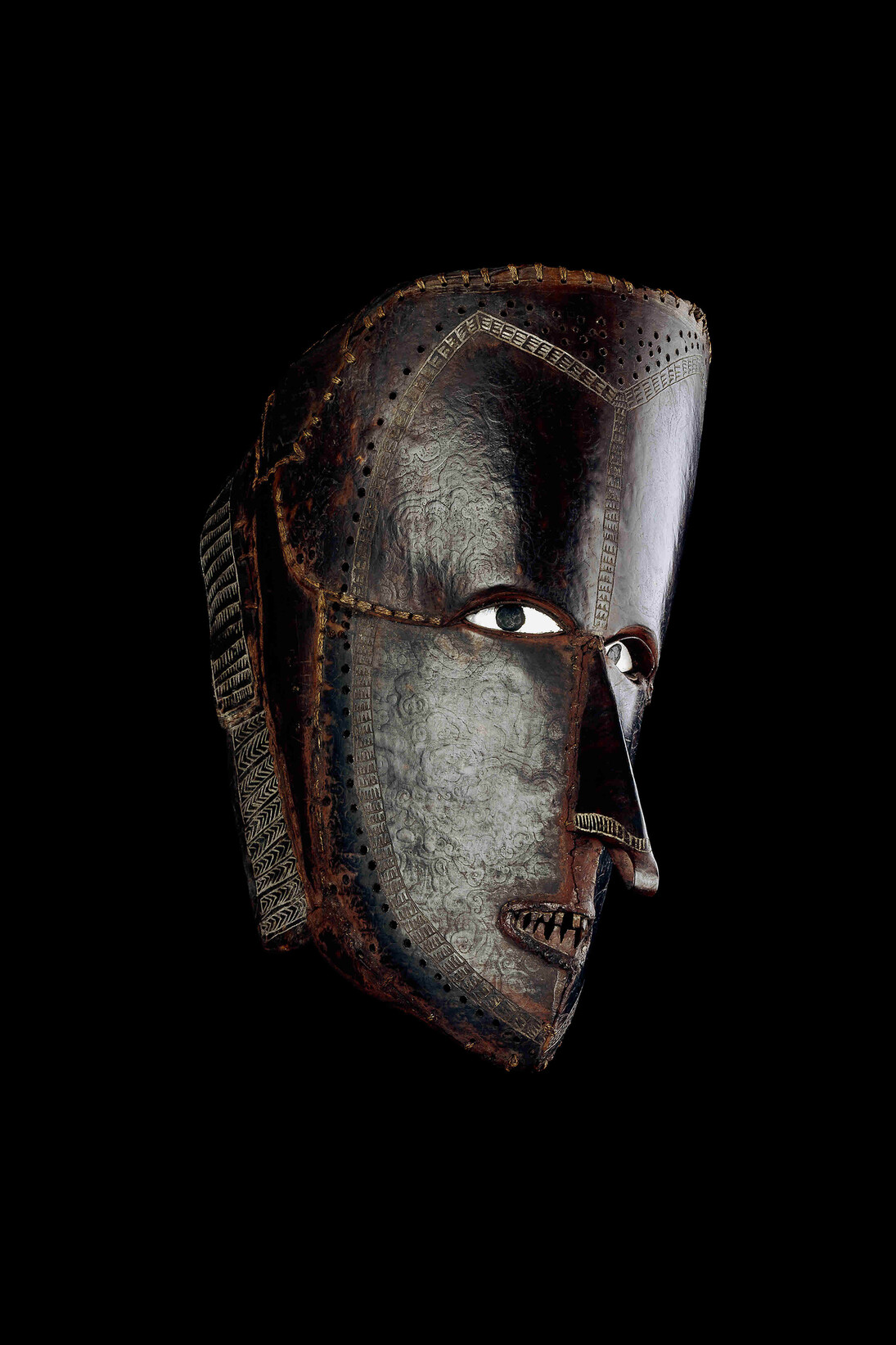 Mask from Mer, Mer, Torres Strait, Queensland, before 1855, Turtle shell, shell, fibre, Torres Strait, before 1855 © The Trustees of the British Museum