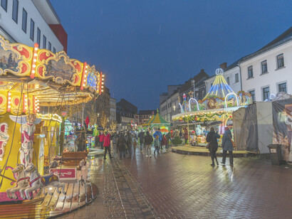 The Weihnachtsmarkt in Germany, a vibrant Christmas market filled with festive cheer