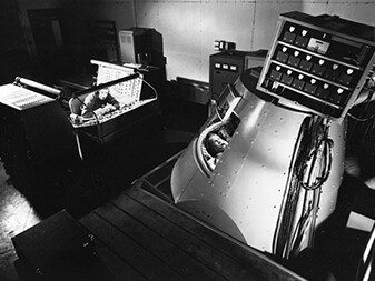 John H. Glenn, one of the Mercury Seven Astronauts, runs through a training exercise in the Mercury Procedures Trainer at the Space Task Group at Langley Field in 1960.
Courtesy NASA Langley Research Center