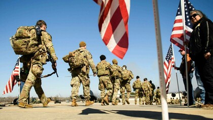 The might of the U.S. military marching across the world to defend democracy