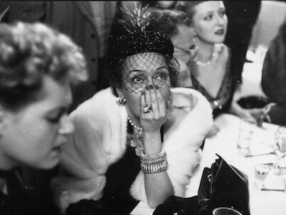 Slim Aarons, Gloria Swanson awaiting the results of the Academy Award for Best Actress at a cafe on West 52nd Street, New York, April 2, 1951