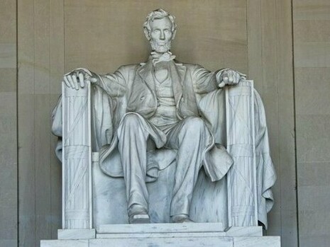 The Lincoln Memorial statue in Washington, D.C. within a historic monument, symbolising the global influence of democratic ideals