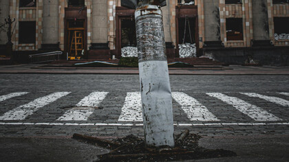 An undetonated missile embbeded into the pavement