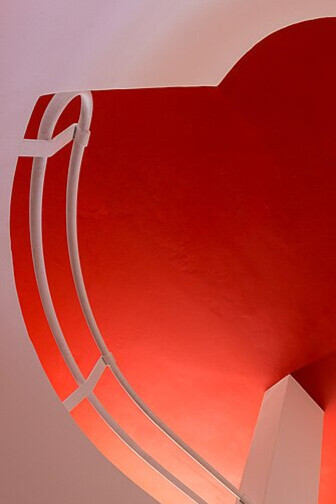 The bold red ceiling of Vilamajó's studio, a ritual colour for Freemasons, adds a dramatic touch to the space, blending symbolic significance with architectural innovation