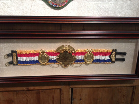 Ken Buchanan, title belt red white blue close up
