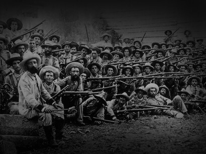 Soldados de la Guerra de Cuba en un descanso de la batalla