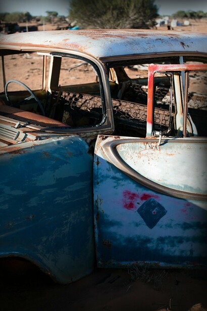 Abandoned car left in open space
