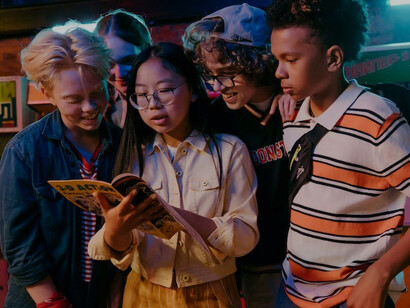 Children captivated by comic book stories