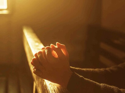 Praying is a form of asking a higher power, God, to help this man in his time of need