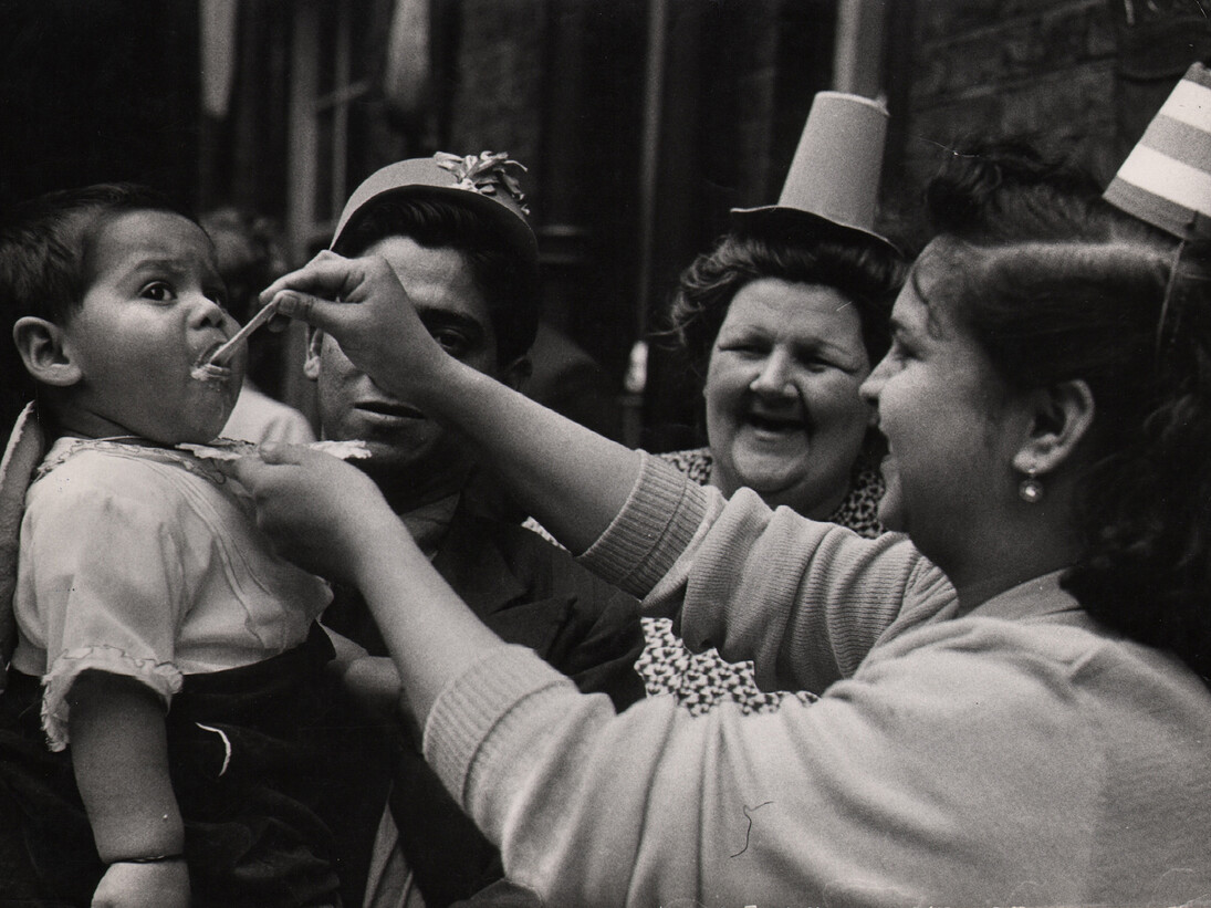 Ernst Haas, Queen’s Coronation Street Party, London, 1952. Vintage silver gelatin print. Estate stamp on print verso. 8 x 11.5 inches © Ernst Haas, courtesy Atlas Gallery