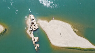 Twenty World War II shipwrecks emerge from the Danube in Serbia as water levels fall dramatically