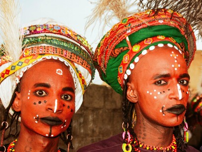 Through vibrant dress and ancestral rituals, these Wodaabe youth stand as a living protest against cultural suppression and miseducation