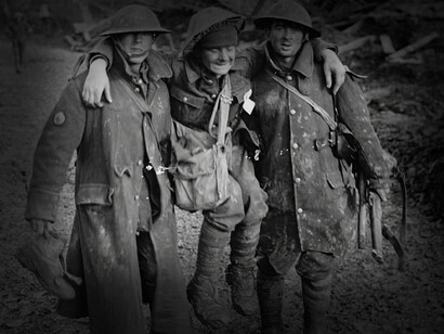 Two british soldiers carrying their injured comrade in WWI, near Turkey