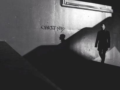 A lone wanderer, traversing a distant and desolate landscape, immersed in solitude