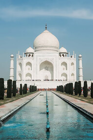 The Taj Mahal is an ivory-white marble mausoleum on the right bank of the river Yamuna in Agra, Uttar Pradesh, India