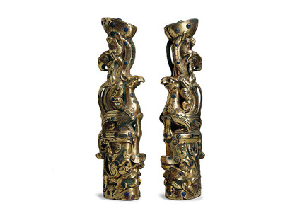 Gilt bronze and glass, 12 1/2 x 4 x 2 1/2 inches. Purchase: the Lillian M. Diveley Fund, Menefee D. Blackwell Fund, Hall Family Foundation. Endowment for the Oriental Department, Asian Art Acquisition Fund in memory of Laurence Sickman and Thomas L. Beckett Fund, 2000.15.1.