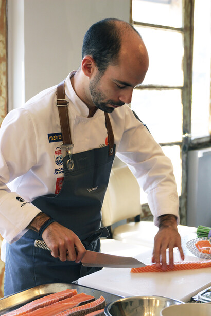 Portuguese Chef Luis Gaspar prepares a salmon dish at The Jerusalem Atelier. Photo by Carrie Hart
