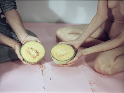 Jenna Westra Duo with Halved Melon (2018). Archival pigment print (framed)