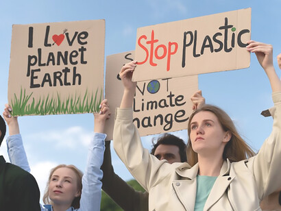 Collective action against global warming through political demonstrations, as climate activists advocate for environmental regulations