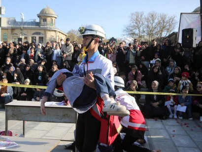 The street play Bell of Heaven was performed in Imam Khomeini Square in Hamedan, portraying the attack on the Shajareh Tayyebeh School in Minab as its central theme, Iran