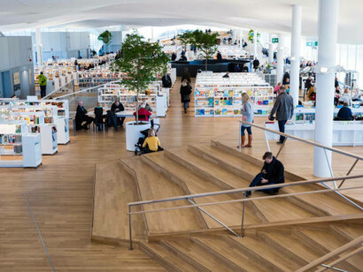 At the New Helsinki Central Library Oodi, students engage in a creative learning environment designed for both individual and group activities