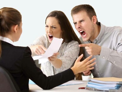 A couple getting angry at the customer service representative