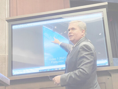Deputy Director of U.S. Naval Intelligence Scott Bray points to a video of a 'flyby' as he testifies before a House Intelligence Counterterrorism, Counterintelligence, and Counterproliferation Subcommittee hearing about "Unidentified Aerial Phenomena," in the first open congressional hearing on 'UFOs' in more than a half-century, on Capitol Hill in Washington, U.S., May 17, 2022