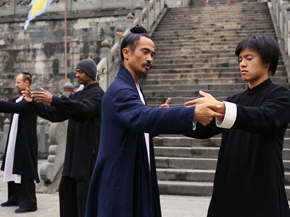 Zhan Zhuang means standing like a tree where one stands still, in an upright posture, as if standing like a tree