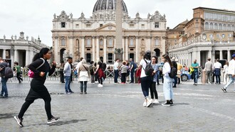 Sara Terracina jogging through Saint Peter's Square, Rome, Italy 
