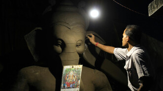 Ganesha the Hindu elephant god symbolizes protection and the removal of obstacles from one's path