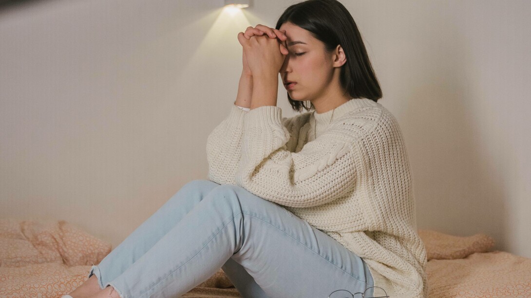 Woman asking the universe for help