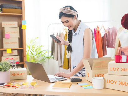 Starting small businesses sme owners entrepreneurs use a laptop to receive and review orders