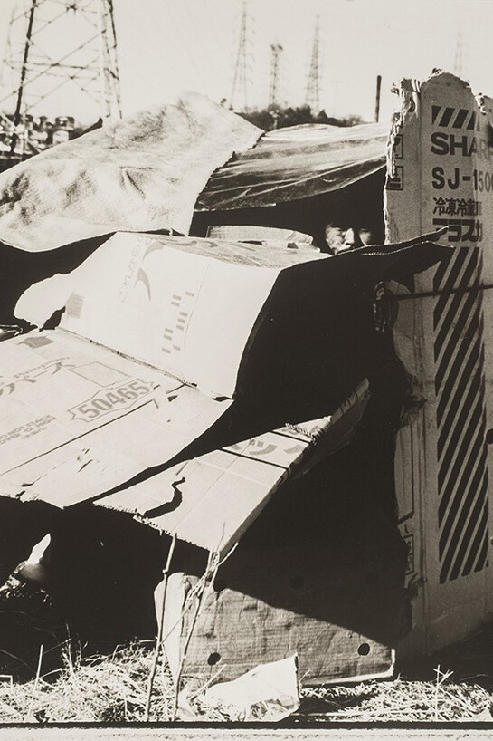 Kiyoshi Suzuki (1943-2000), A Man in Cardboard Boxes, Urasaki Tetsuo, Yokohama, from the series Mind Games, 1981, Gelatin silver print, 11 15/16 X 10 1/16 in, Museum of Fine Arts, Houston, purchase funded by the Caroline Wiess Law Accessions Endowment Fund, 2014