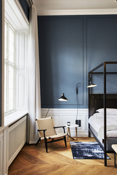 A serene deluxe room at Nobis Hotel, blending understated luxury with quiet elegance for a truly restful experience, Copehagen, Denmark