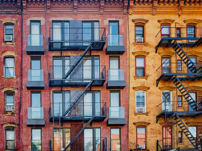 Real-estate investment trusts make money, not building houses, but doing business