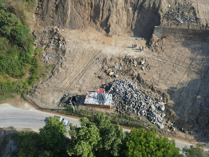 Tree roots hold soil together. Without them, soil washes away easily and landslides become more likely
