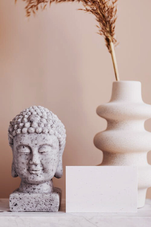 The calm presence of Buddha's visage symbolises the Stoic idea of focusing on what is within one’s control, urging individuals to direct their energy where it can truly make a difference