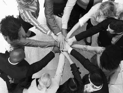 A group gathering and sharing interdependence, which could bring us closer together and closer to solutions