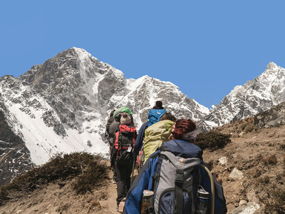 Nepal, offers a scenic hiking adventure through its snow-covered mountain landscapes