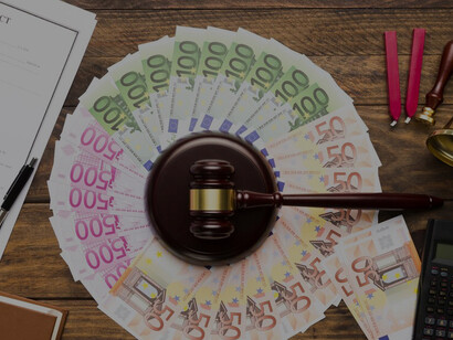 The visual appeal of discussions on labor market negotiations by incorporating elements such as a judge's gavel, a pile of books, and Euros neatly arranged on a table, symbolizing the implications of the minimum wage directive