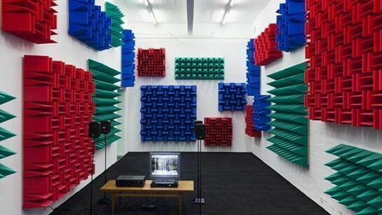 Haroon Mirza , Digital Switchover, 2012, Installation View, Kunst Halle Sankt Gallen, St.Gallen, 2012, 1 x control box, 4 x active speakers, 1 x relay, 1 x DVD player, 1 x TFT monitor, LEDs, foam. Courtesy the artist and Kunst Halle Sankt Gallen, Photo Gunnar Meier, © Haroon Mirza