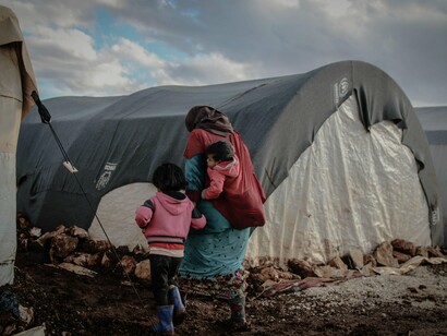 A mother with her children, they are living in poverty
