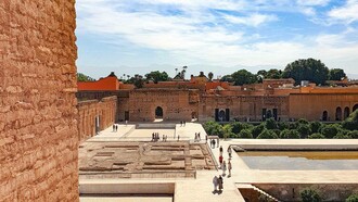 Tourists enjoying El Badii palace, Marrakesh, Morocco