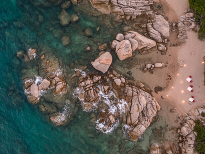 Experience the perfect sea view from a bird's eye perspective while staying at Delphina Hotels in scenic Sardinia, Italy
