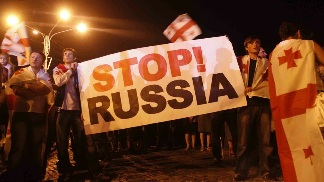 Protests erupt in Georgia against the Russian occupation, with citizens holding banners that boldly declare, "Stop Russia", Tbilisi, Georgia, 2008