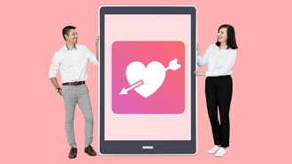 A couple viewing a dating app on a tablet, exploring online dating together