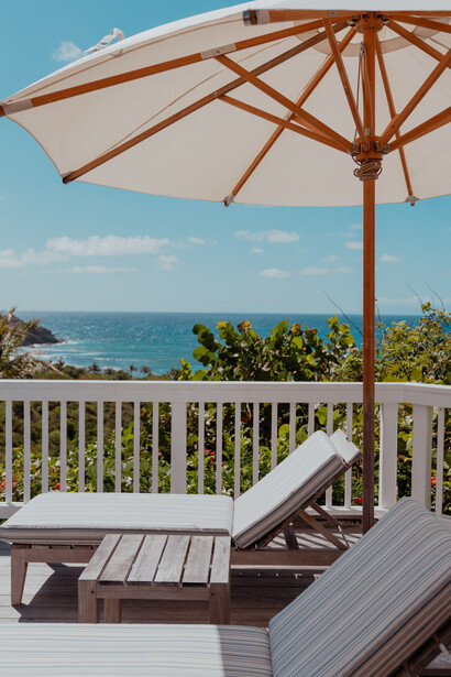 At Le Toiny Hotel & Beach Club in St. Barthélemy, guests can enjoy gourmet dining with stunning views of the island