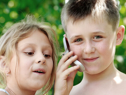 What are the consequences of EMR exposure for children with developing brains? 