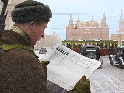 USSR soldier reading a ‘Правда’ (‘True’) newspaper, during wartime in Moscow 
