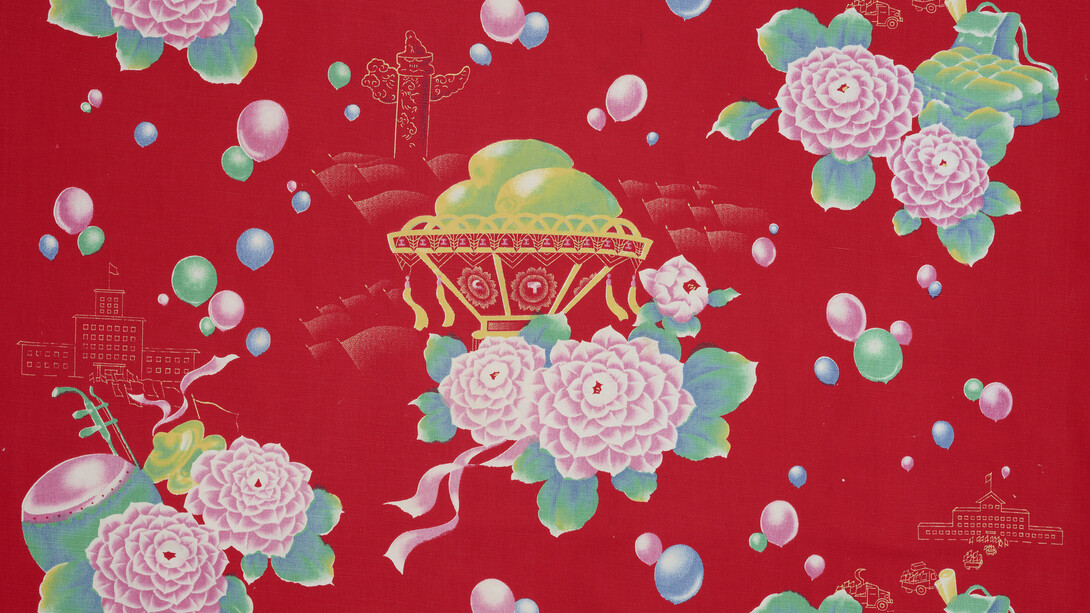 Quilt cover with design of baskets of three mangoes, student backpacks, and convoy of trucks, 1968. Printed cotton, 201 x 78 cm